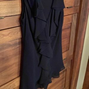 Woman’s black silk sleeveless ruffled  blouse
